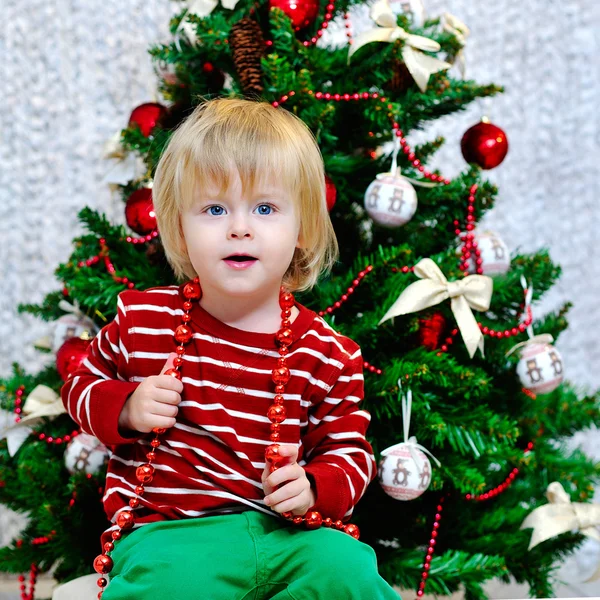 Little boy preparing for Christmas holidays