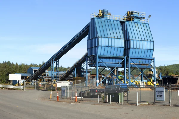 Log yard entrance processing plant.