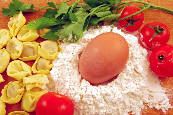 In the kitchen - tortellini stuffed with tomatoes, egg, flour
