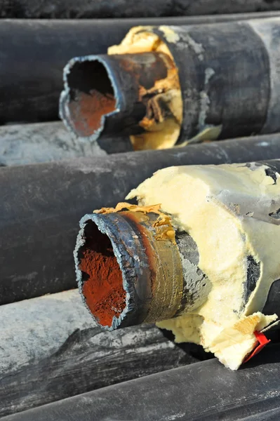 Rusty steel pipe with heat insulation