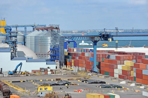 Cargo container, pipe and grain drayer in port