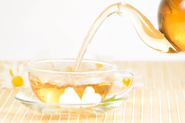 Teacup with herbal chamomile tea