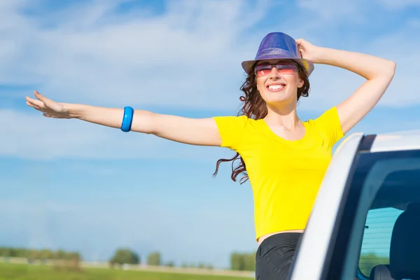 Young woman got out of car window