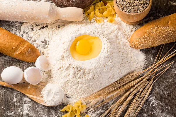 Flour, eggs, wheat still-life