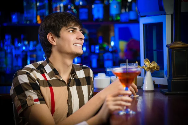 Young man at the bar