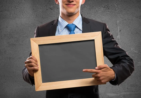 Businessman with frame