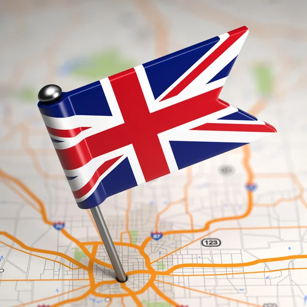 Great Britain Small Flag on a Map Background.