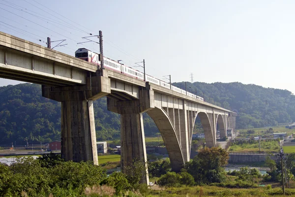 Train crossing a viaduct
