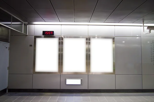 Blank billboard in metro station