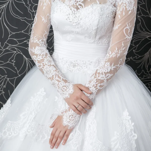 Lace white wedding dress with long sleeves