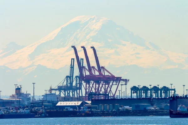 Seattle Port with Red Cranes and Boats with Mt Ranier in the bac