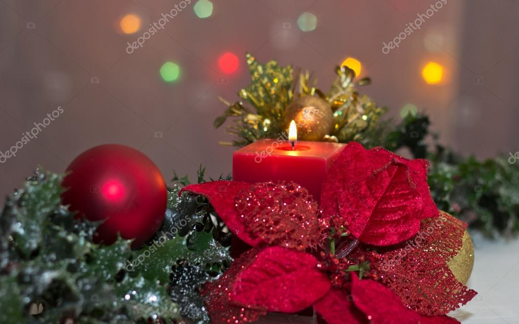 Poinsettia and Candle — Stock Photo © Bernilynn #12647098