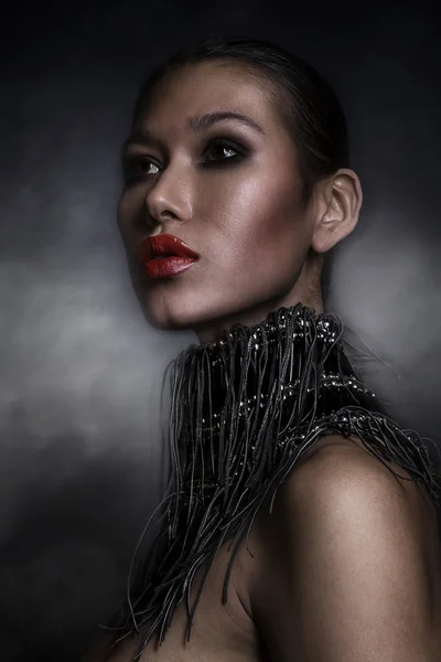 Fashion Woman Portrait. Vogue Style Model. Stylish Makeup