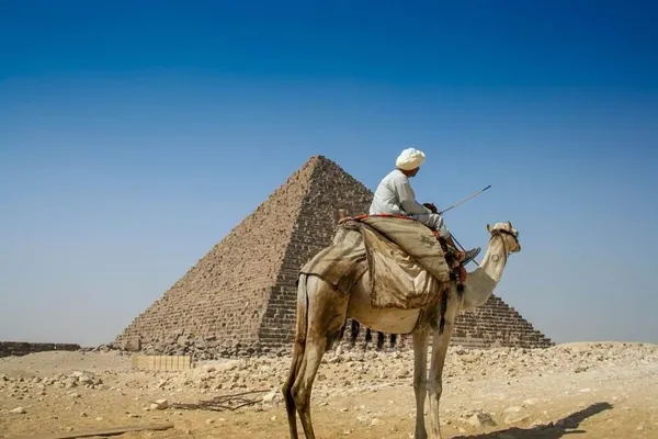 Camels around pyramids, Cairo Egypt