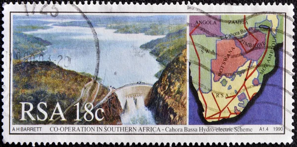 SOUTH AFRICA - CIRCA 1990: A stamp printed in RSA dedicated to hydroelectric cooperation in Southern Africa shows landscapes and maps, circa 1990.