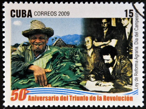 CUBA - CIRCA 2009: A stamp printed in cuba dedicated to 50 anniversary of the triumph of the revolution, shows agrarian reform law, Farmer\'s Day, circa 2009