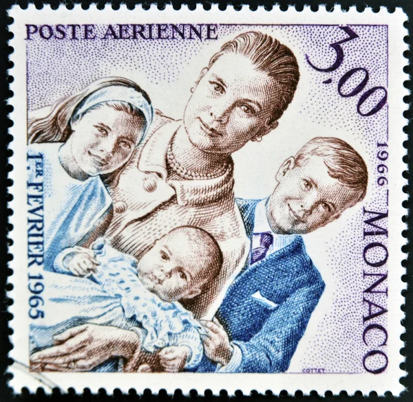 MONACO - CIRCA 1966: a stamp printed in Monaco shows Grace Kelly an her children princess Caroline, prince Albert II and princess Stephanie, circa 1966.