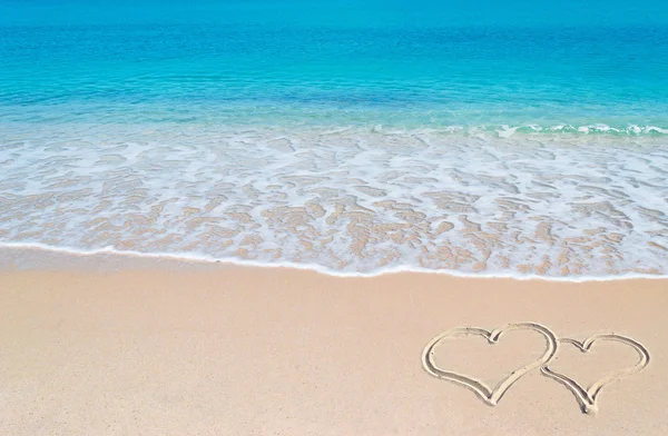 Turquoise foreshore and hearts