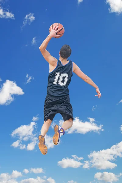 Left hand dunk among the clouds