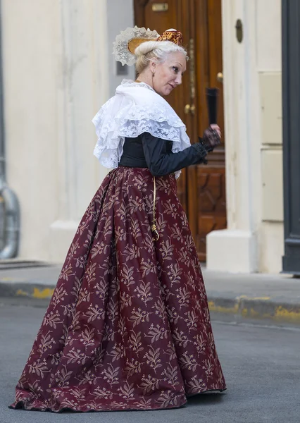 Arles, woman with traditional costume