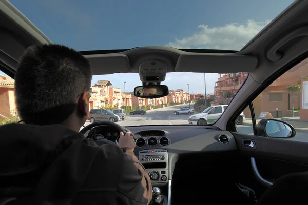 Man driving a car