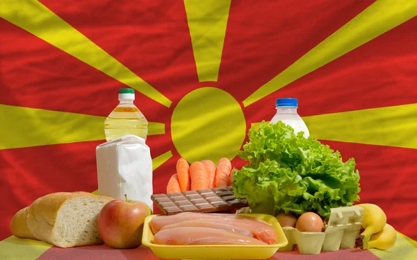 Basic food groceries in front of macedonia national flag