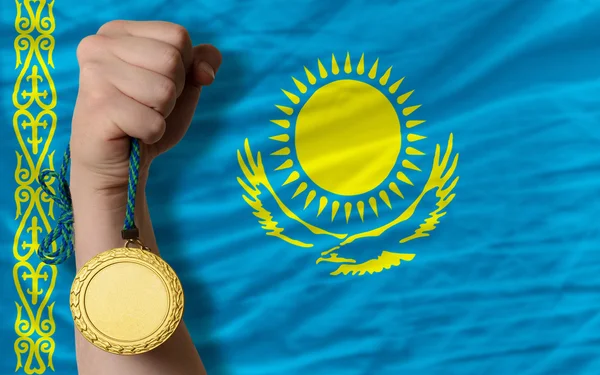 Gold medal for sport and national flag of kazakhstan