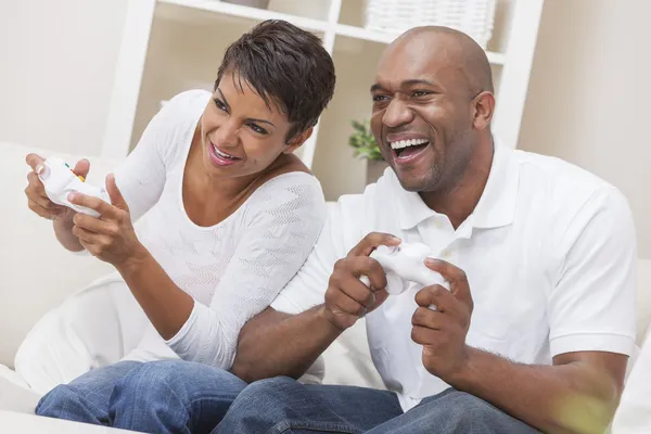 African American Couple Playing Video Console Game