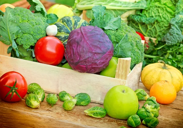Organic fruits and vegetables in a creates