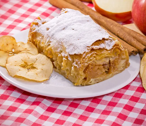 Apple strudel - apple cake on white plate for dessert