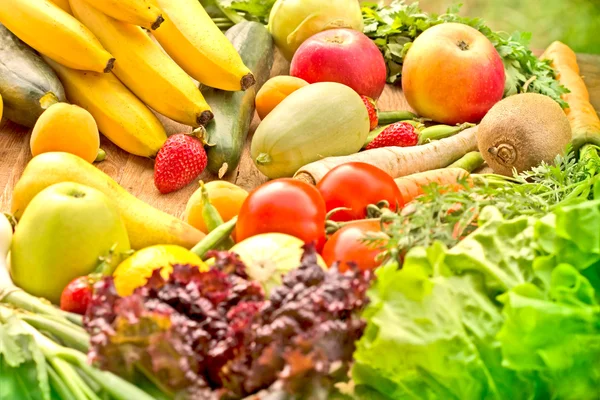 Fresh organic fruits and vegetables on table