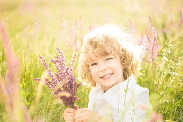 Child holding flowers