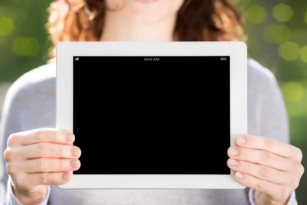 Woman hands holding tablet PC
