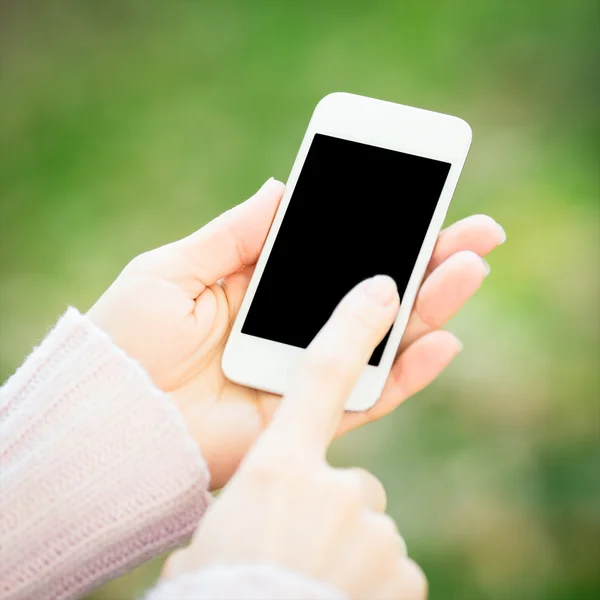 Smartphone in woman hands