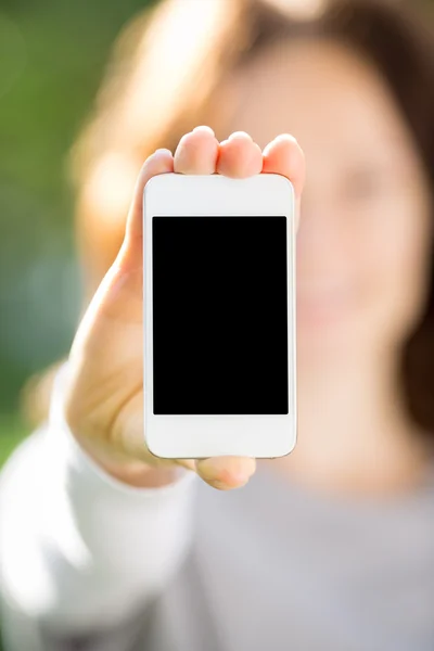 Woman holding smart phone