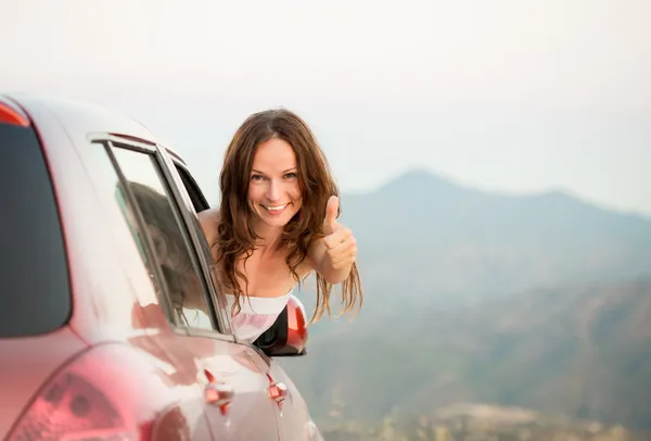Happy driver woman on summer vacation