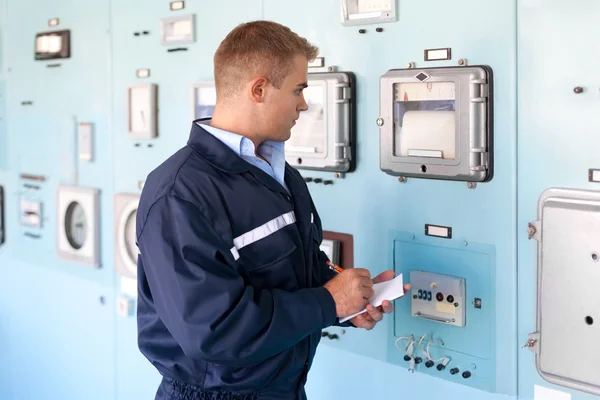 Portrait of young engineer at control room