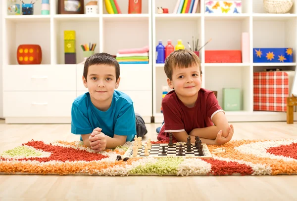 Young kids preparing to play chess