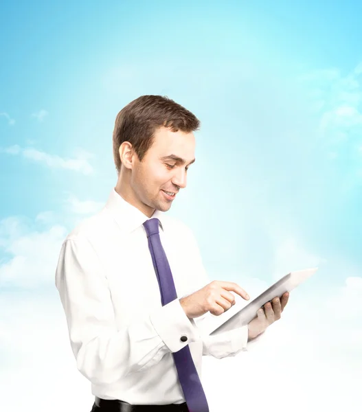 Businessman holding tablet