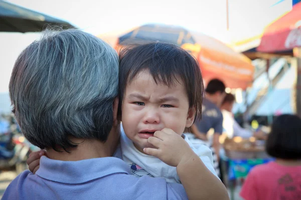 Close up crying face of two years old child