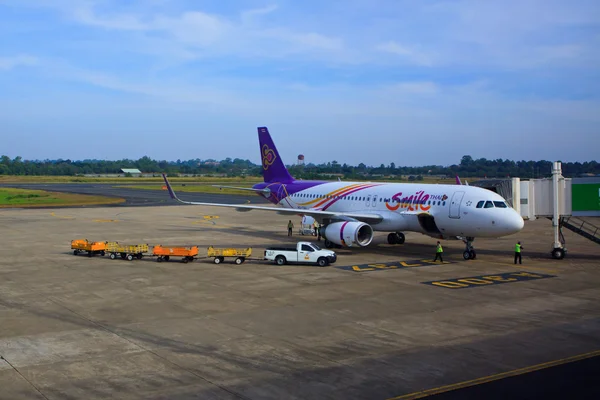 UBON RATCHATHANI THAILAND - Nov21 - thai airway plane parking on gate way and preparing to flying at Ubon Ratchathani international air port on november 21,2013 in Ubon Ratchathani, Thailand.