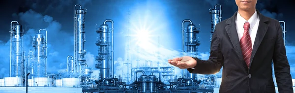 Business man and refinery industry plant use for heavy industry and petrochemical industry theme