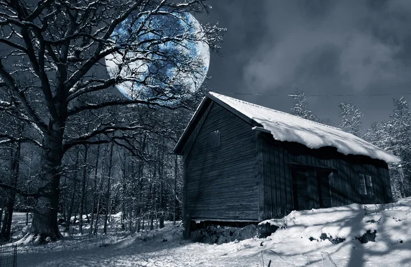 Old rural barn, winter scenery and full-moon