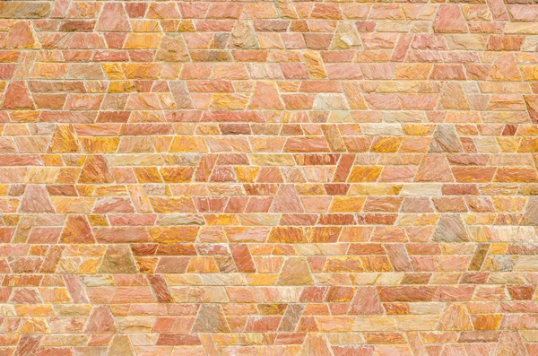 Pattern of red slate stone wall surface