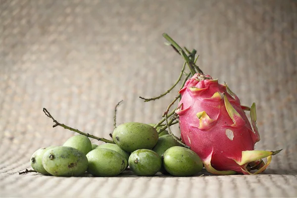 Mango stack with Dragon fruit on mat background (Still life)