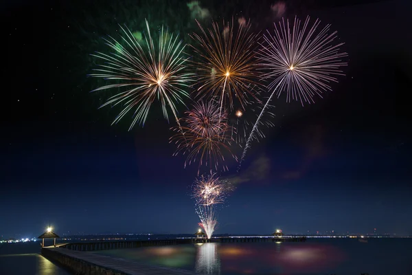 Wooded bridge in the port between new year celebration