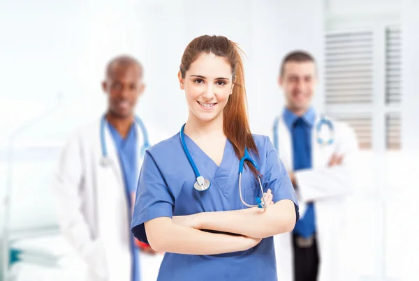 Nurse in front of her medical team