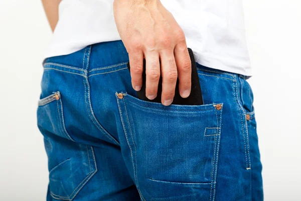 Man taking his wallet in his pocket