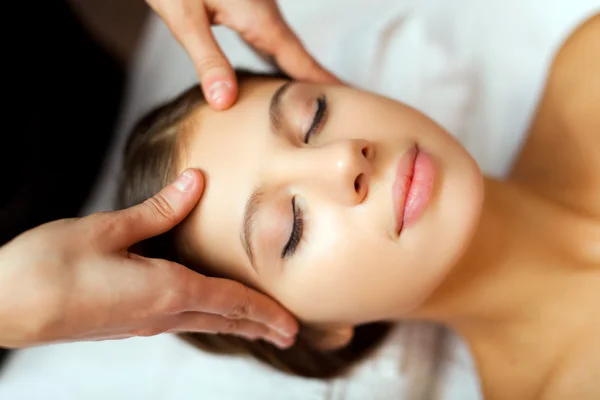 Woman having a facial massage