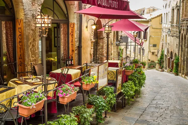 Vintage cafe on the corner of the old city in Italy